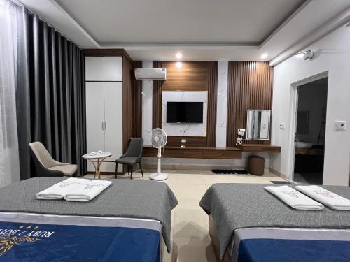TV a/nebo společenská místnost v ubytování Ruby 2 Hotel