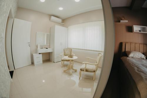 Ένα ή περισσότερα κρεβάτια σε δωμάτιο στο Prenoćište Park