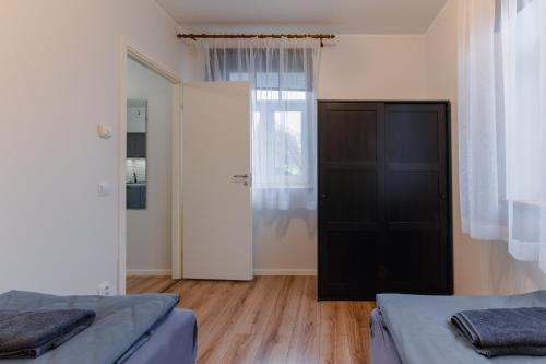 Ein Bett oder Betten in einem Zimmer der Unterkunft Posti Guesthouse
