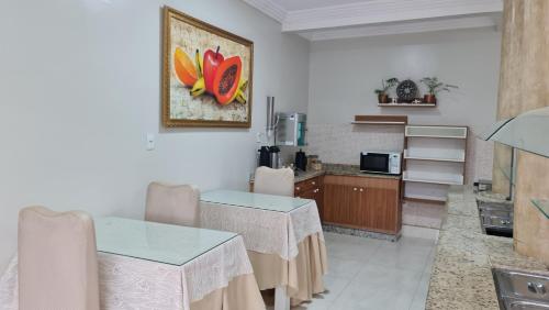 Televisyen dan/atau pusat hiburan di Faixa Hotel