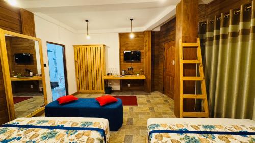 Letto o letti in una camera di Palmyra Nature Resort Sigiriya