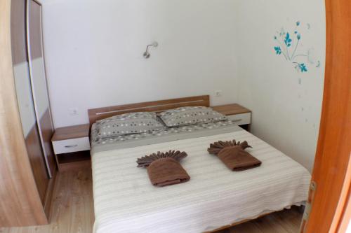 Postel nebo postele na pokoji v ubytování apartmant Clinton