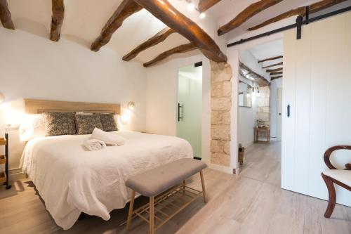 Postel nebo postele na pokoji v ubytování Casa Rural Encantadora