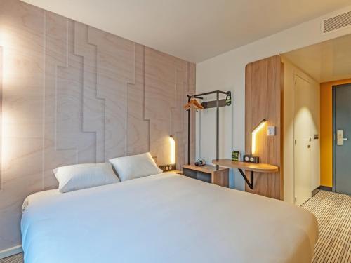 Postel nebo postele na pokoji v ubytování B&B HOTEL Brest Porte de Gouesnou