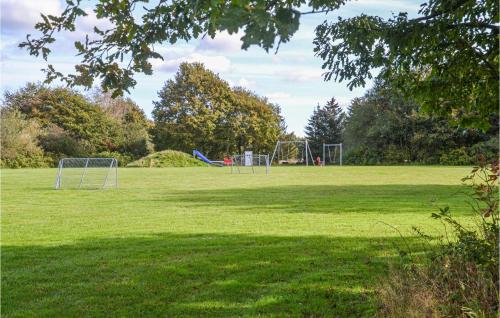 a field with two soccer goals in a park at Beautiful Home In Hovborg With Wifi in Hovborg