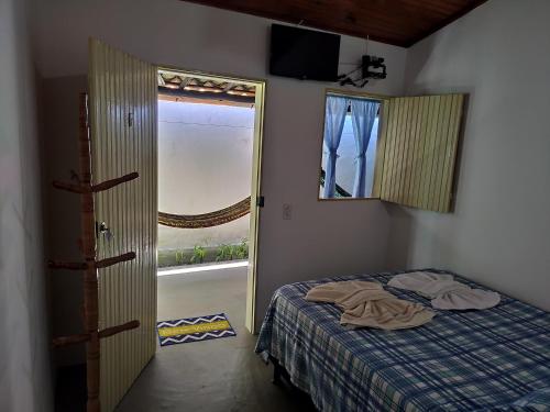 Postel nebo postele na pokoji v ubytování Pousada Lua Mar Arraial d'Ajuda