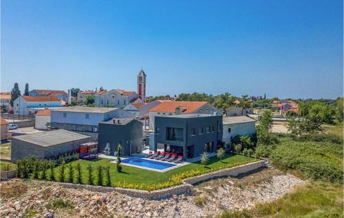 an aerial view of a house with a pool at Villa Lux in Donji Zemunik