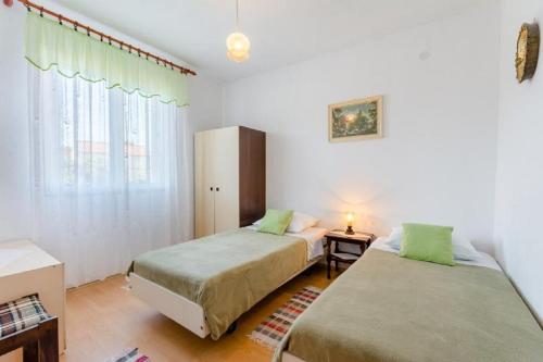 Katil atau katil-katil dalam bilik di Apartment Matko