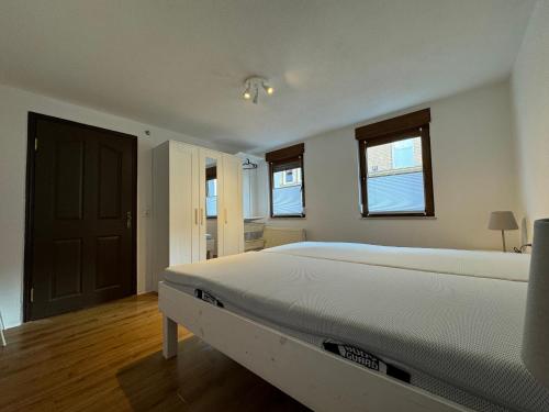 Postel nebo postele na pokoji v ubytování 2 Zimmer Apartment mit kostenlosem Parkplatz