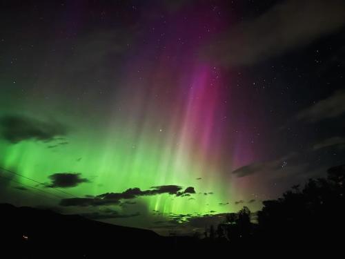 an image of the northern lights in the sky at Bjørkli Lodge in Geilo