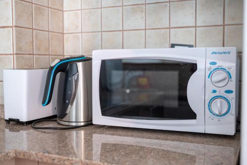 Apartaments Ashomeにあるキッチンまたは簡易キッチン