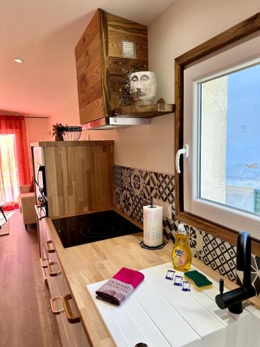 Η κουζίνα ή μικρή κουζίνα στο Le Duplex du Parc - Terrasse