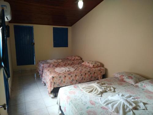 Postel nebo postele na pokoji v ubytování Pousada Lua Mar Arraial d'Ajuda