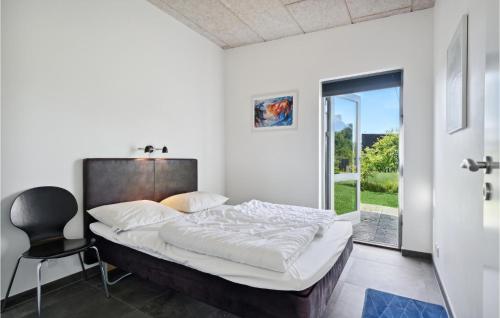 Katil atau katil-katil dalam bilik di 4 Bedroom Lovely Home In Skjern