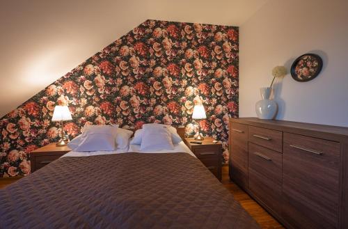 Кровать или кровати в номере Apartamenty Gaja