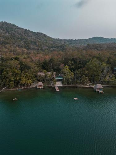 an aerial view of a lake with boats in it at Hotel Gringo Perdido in El Remate