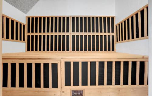 a room with wooden bunk beds in a room at 7 Bedroom Gorgeous Home In Ulfborg in Øby