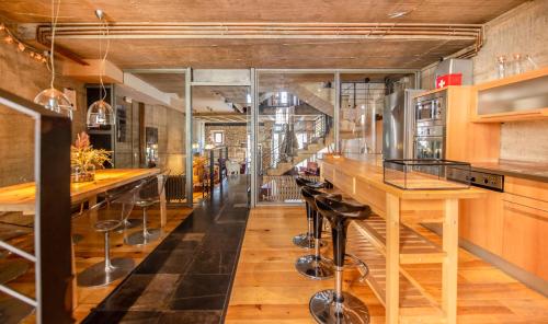 Reštaurácia alebo iné gastronomické zariadenie v ubytovaní Loft Rural LaCalata