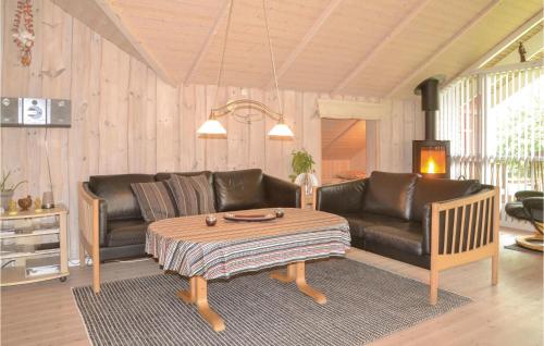Posezení v ubytování Three-Bedroom Holiday Home In Oksbol