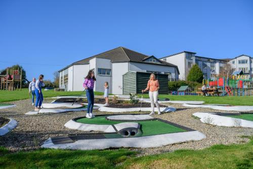 a group of people standing in a park at Newtown Park Hotel in Wexford