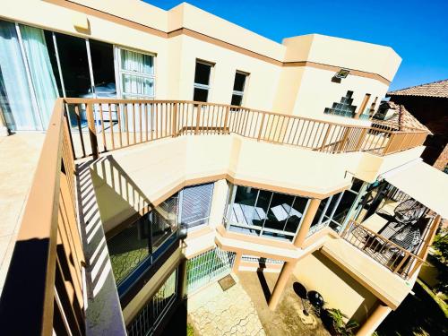an aerial view of a house with a balcony at Hotel Vibes Cape Town Plattekloof in Cape Town