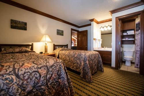 Ένα ή περισσότερα κρεβάτια σε δωμάτιο στο Sunburst Condominiums