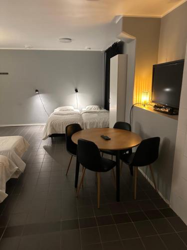 Postel nebo postele na pokoji v ubytování Hotell Salem