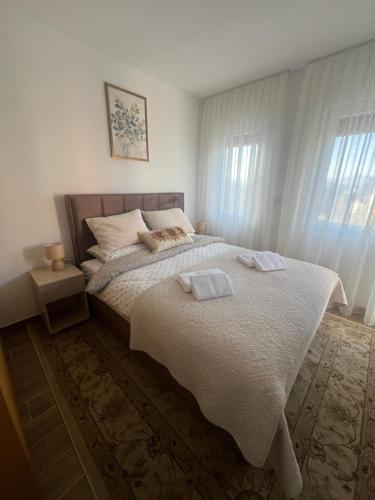 Postel nebo postele na pokoji v ubytování Marshall Apartments - Zlatibor