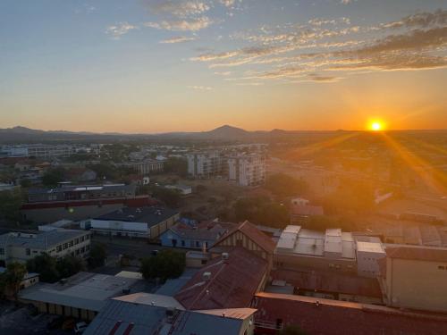 an aerial view of a city at sunset at Tranquility Luxury Suite, 77 on Independence Ave in Windhoek