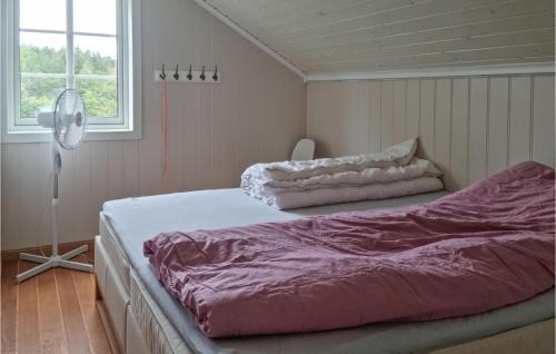 Ένα ή περισσότερα κρεβάτια σε δωμάτιο στο Lovely Home In Grimstad