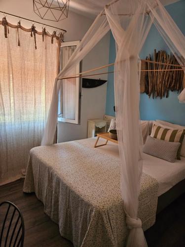 Кровать или кровати в номере VILLA VILLACOLLE