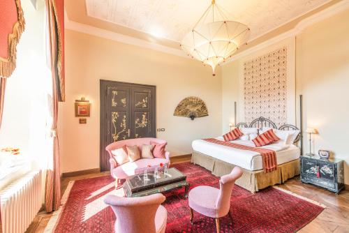 Postel nebo postele na pokoji v ubytování Chateau Mcely