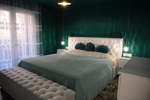 Ένα ή περισσότερα κρεβάτια σε δωμάτιο στο The Luxe Haven