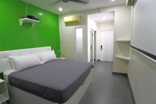 Un ou plusieurs lits dans un hébergement de l'établissement WET hotel - Adults Only