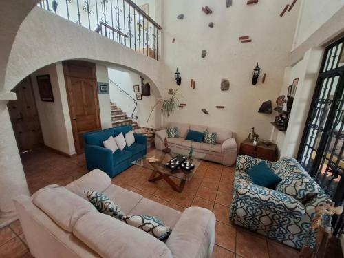Ruang duduk di Hermosa casa estilo rustico en Puebla de Zaragoza