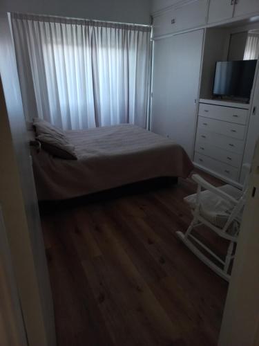 Una cama o camas en una habitación de Jana house
