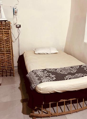 a room with two beds in a room at Heissa Hostel in Aswan