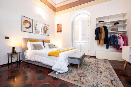Ένα ή περισσότερα κρεβάτια σε δωμάτιο στο Sassari Apartments - Levante