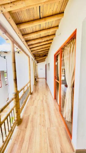 Hotel La Aldea Pijaoにあるベッド