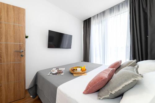 Ένα ή περισσότερα κρεβάτια σε δωμάτιο στο Villa Laurel