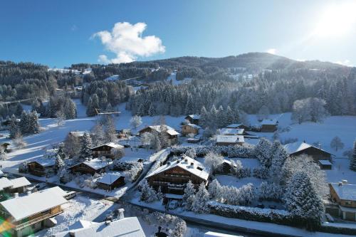 an aerial view of a ski resort in the snow at Magic Megève Bois in Demi-Quartier