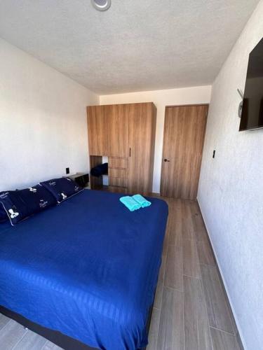 Ένα ή περισσότερα κρεβάτια σε δωμάτιο στο Casa Querétaro Facturamos