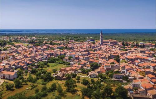 an aerial view of a town with a church at Holiday Home Butkovici Croatia in Butkovići