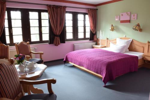 Postel nebo postele na pokoji v ubytování Hotel Landhaus Marienstein