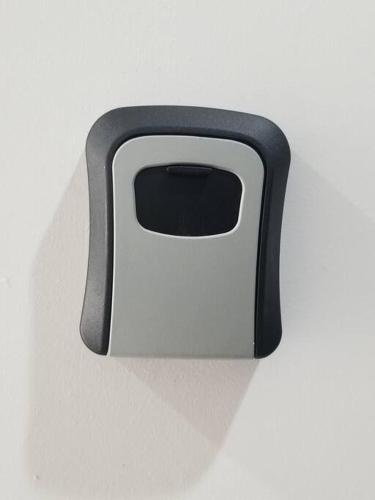 a black and white object on a white wall at Jardines de Miraflores, Casa Remodelada completa zona sur ITESO TecMilenio UVM HP Colon Centro Sur in Guadalajara