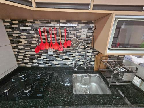 Køkken eller tekøkken på Apto Confortável com 2 quartos em Batista Campos