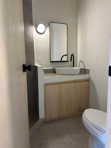 Koupelna v ubytování Estudios Pia