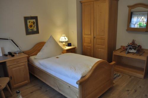 Postel nebo postele na pokoji v ubytování Hotel & Restaurant Bei Hölzchen
