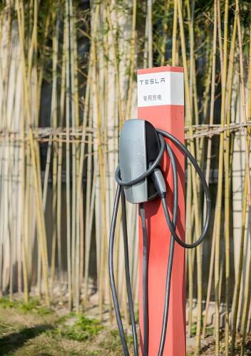 a pay phone sitting on top of a post at Best Boutique Hotel in Nanhui