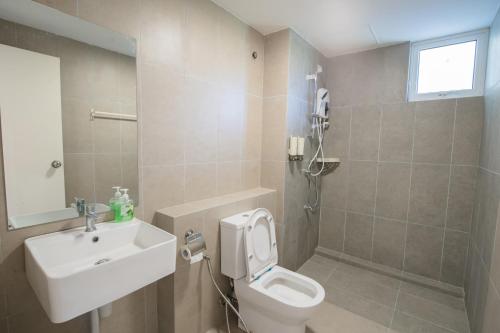 Koupelna v ubytování Trival Gloryland Homestay Sri Indah Sandakan